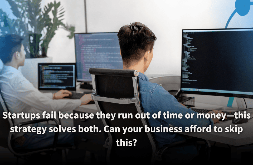 Two developers working at their desks, focused on coding displayed on multiple computer monitors. The scene highlights the critical importance of efficient strategies to save time and money for startup success.
